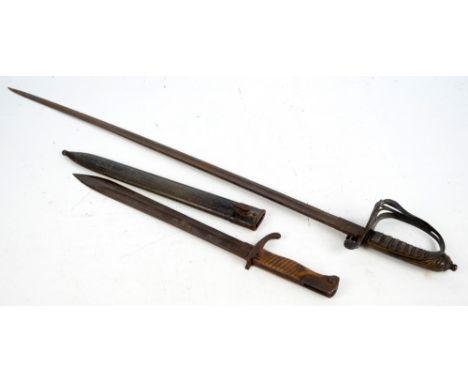 A cavalry sword with GR cypher to the knuckle guard and shagreen and wire hilt, length of blade 81cm, and a WWI bayonet with 