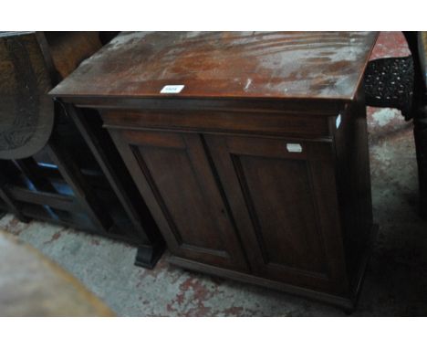 A 19th century mahogany table top cabinet with pair of cupboard doors enclosing one shelf, with turned feet, width 58cm.