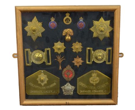 A collection of Guards related items with Coldstream, Grenadier and Welsh to include two named bed plates, two buckles, cap b