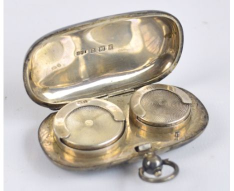 An Edward VII hallmarked silver sovereign and half sovereign case with spring action hinged lid and foliate engraved decorati
