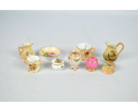 A collection small Royal Worcester pieces including a jug painted with pheasants by James Stinton, green printed marks, heigh