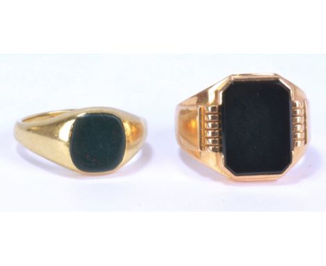 A gentleman's 18ct yellow gold and black onyx signet ring, size U, approx. 14.5g, and a gentleman's 9ct yellow gold bloodston