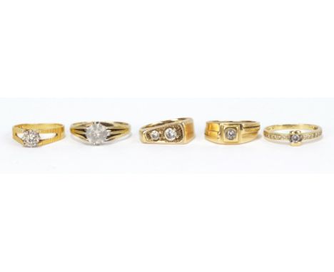 An 18ct yellow gold and diamond solitaire ring in an illusion setting, and four further 9ct gold rings, combined approx 17g (