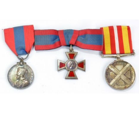 A group of three medals comprising George V Royal Red Cross Associate Medal with ribbon, Imperial Service Medal awarded to Da