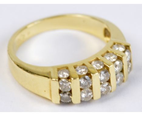 A 14ct yellow gold and diamond ring, the raised platform set with 20 small diamonds, size J1/2, approx 4g.