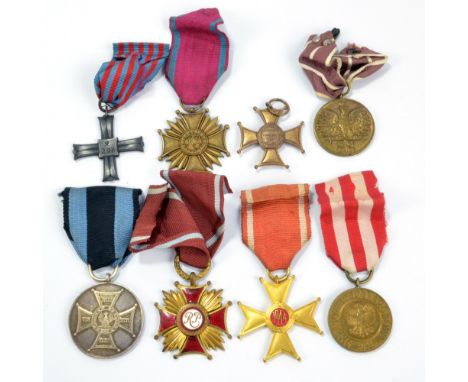 A group of Polish medals including Order of Virtuti Militari, Order of Polonia Restituta, Monte Cassino Commemorative Cross, 