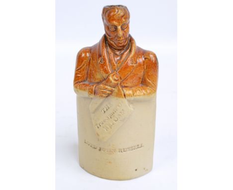 A Doulton & Watts reform flask depicting Lord John Russell, inscribed 'The True Spirit of Reform', height 18.5cm.   CONDITION