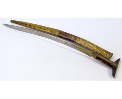 A 19th century Ottoman yataghan with horn handle, decorative brass overlay to the shaped blade and brass bound wooden scabbar