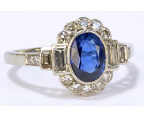 An 18ct white gold and platinum diamond and synthetic sapphire ring in the Art Deco manner, size L 1/2, approx. 3.1g.