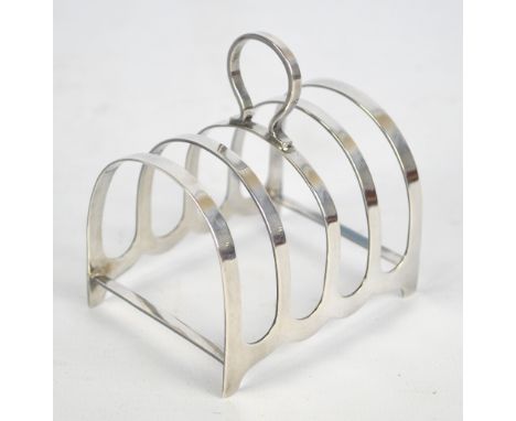 A George VI hallmarked silver four division toast rack, Sheffield 1945, length 7.5cm, approx. 1.8ozt.