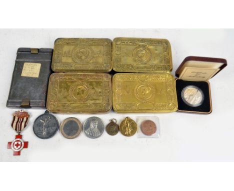 A collection of militaria comprising four Christmas 1914 tins, a WWI Victory Medal, Queen's Reg., 56067 Pte. S. J. Dean, a 19