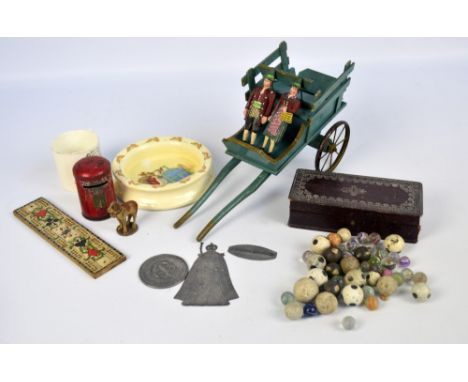 A quantity of toys to include blue painted wooden cart, tinplate money box in the form of a George V post-box, two painted wo