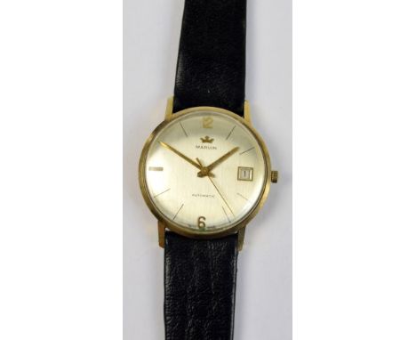 MARVIN; a gentleman's vintage 9ct gold cased wristwatch, the circular silver dial inscribed 'Marvin Automatic' and with date 