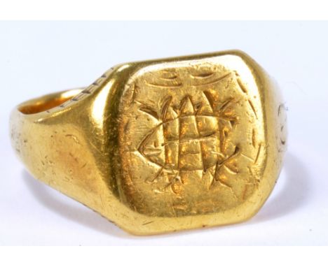 An 18ct yellow gold gentleman's signet ring with initialled rounded square platform, size L, approx 6.4g.