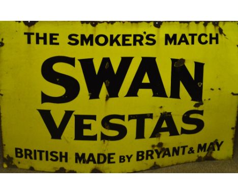 A Swan Vestas enamel sign, 93 x 122cm.   CONDITION REPORT:  Areas of corrosion/rusting and general weathering. 