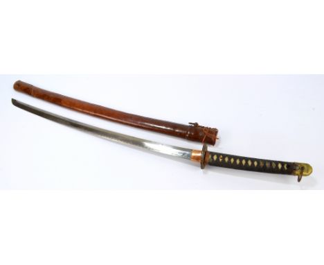 A Japanese Meiji period katana with cloth bound shagreen grip, pierced floral decorated tsuba and slightly curved blade in le