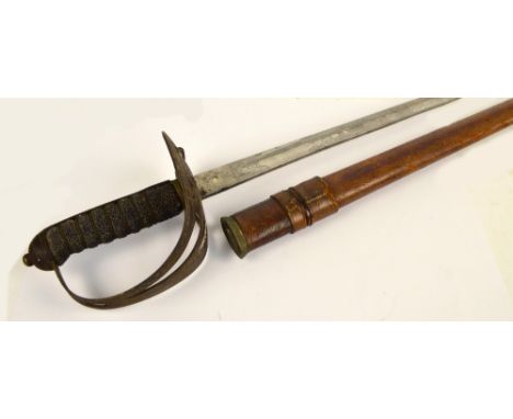 A George V dress sword with textured grip, pierced knuckle guard, etched blade and leather scabbard, length 101cm.