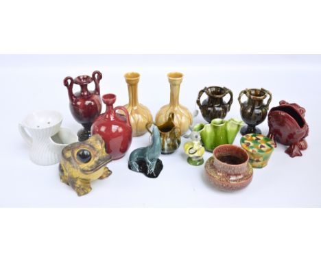 A quantity of decorative art ceramics including a red glazed vase with swan neck handles, height 18cm, a pair of Dublin slow 