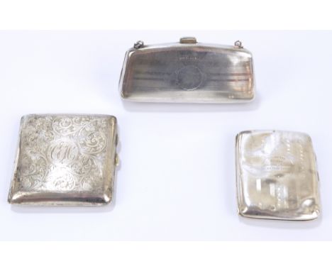 FH ADAMS & CO; a George V hallmarked silver cigarette case of rounded rectangular form overall engraved with foliate scrolls,