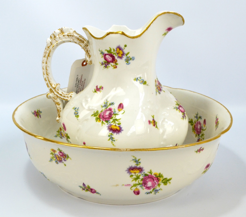 An early 20th century Limoges chamber jug and bowl with painted and