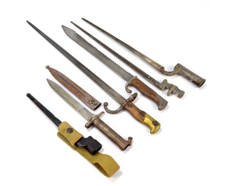 A group of six bayonets to include a saw backed example, a chassepot, socket bayonet and small spike bayonet.    CONDITION RE