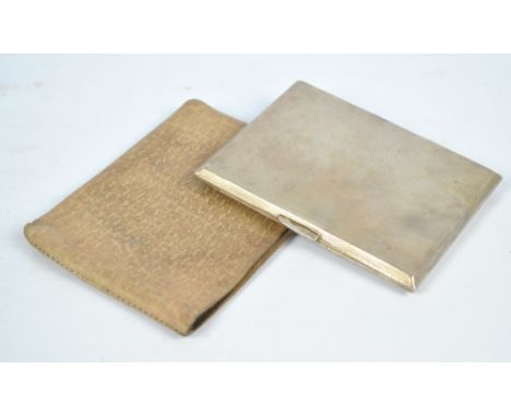 A George VI hallmarked silver cigarette case of rectangular form with engine turned decoration, Birmingham 1944, 11.5 x 9cm, 