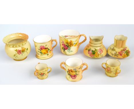 A group of Royal Worcester blush ivory pieces to include a miniature loving cup marked in puce, 1907, a moustache mug, 1899, 
