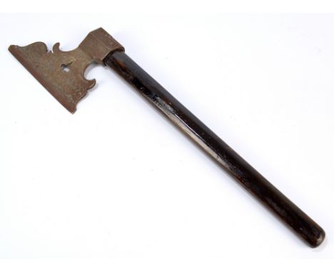 An ebonised shafted axe with foliate scroll and bird decorated engraved blade, length 54.5cm.