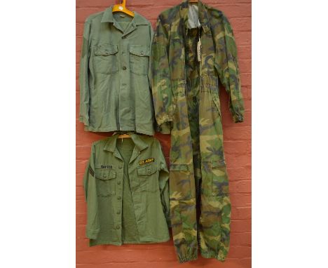 An American military camouflage tank boiler suit, a 1960s US Army khaki heavyweight shirt and a further shirt and trousers.