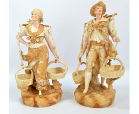 A pair of continental bisque figures of country man and woman with gilt and enamel decoration, height of taller 42.5cm, marke