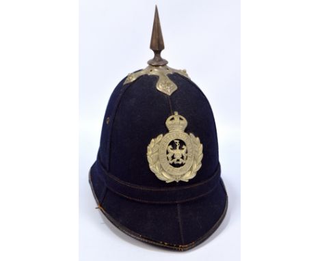 An early 20th century Newcastle-upon-Tyne blue velvet police helmet with spike, leather lining inscribed 'Hobson & Sons Londo