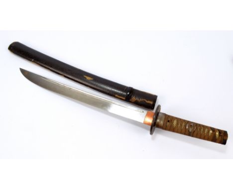 A Japanese Meiji period wakitashi, with cloth bound shagreen handle, signed tang, decorated iron tsuba and slightly curved bl