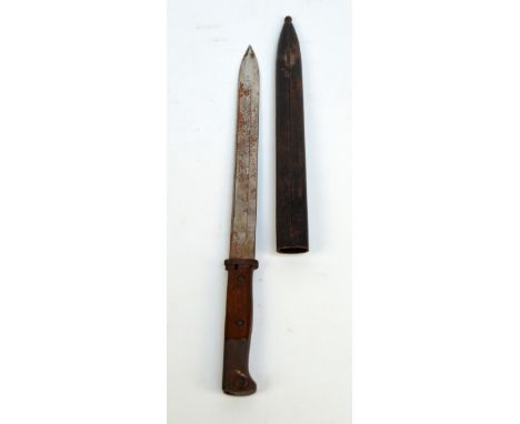 A WWI period bayonet with metal scabbard, length 47cm.   CONDITION REPORT:  Traces of mark 'D& ' / 'DO'  to blade, illegible 