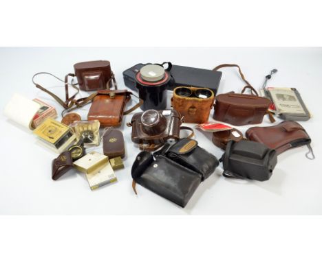 A group of vintage cameras and accessories to include Minolta and Bessa, also a pair of field glasses by Dollond of London.