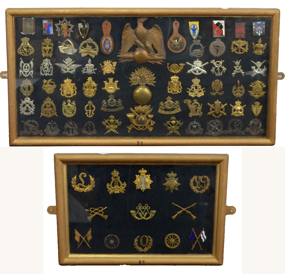 A collection of British and international cap badges to include ...