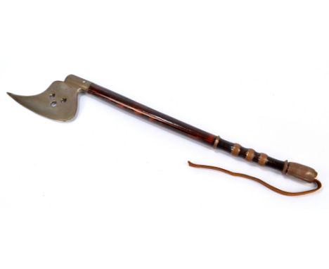 A wooden shafted axe with ribbed metal mounted grip, length 73cm.   CONDITION REPORT:  Shipping can be provided to the UK onl