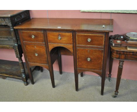 A 19th century mahogany crossbanded sideboard with three drawers above one cupboard door and drawer with four sectioned decan