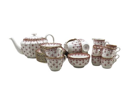 Spode red Fleur de Lys tea and coffee service comprising six tea cups and saucers, ten tea plates, tea pot, milk jug, sugar b