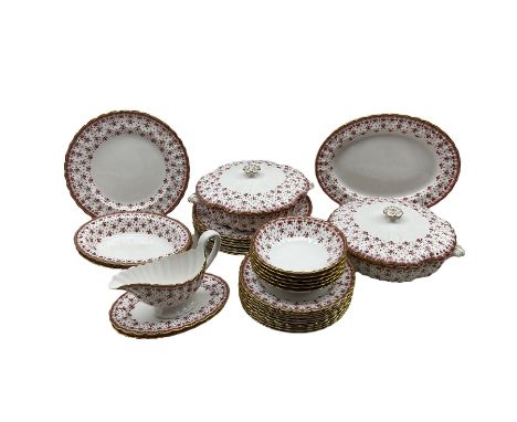 Spode red Fleur de Lys pattern dinner service comprising eight dinner plates, ten dessert plates, six dessert bowls, pair of 