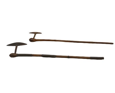 19th century Zulu axe, having a steel blade and wooden shaft with sections of wire binding, L96cm and another (2)