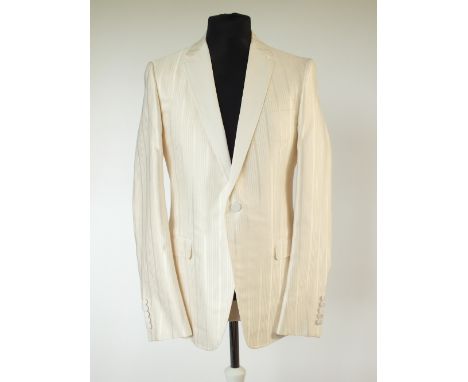 A Gucci dinner suit, cream, self strip with twill lower lapel, single vent, Gucci G embroidered to lining at back, Italian si