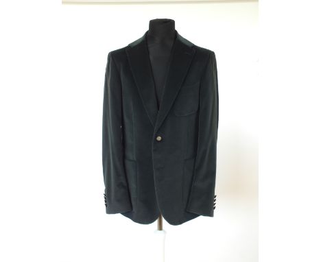 A Gucci jacket, dark blue/grey, self patterned velveteen, patch pockets, single vent, Gucci crested buttons, Italian size 52R