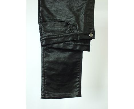 A pair of Gucci jeans, black, plasticised denim, Italian size 50, 98% cotton, 2% elastine, button fly, leather effect, rubber