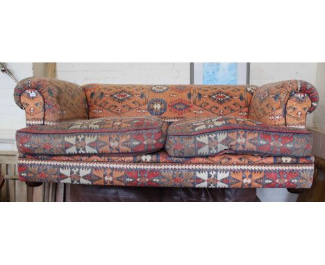 A Jarrolds Tetrad two seater sofa with Aztec design upholstery