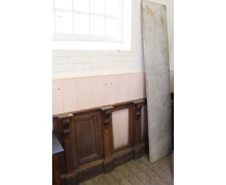 A Victorian pitch pine shop counter front panel with marble top (as found)