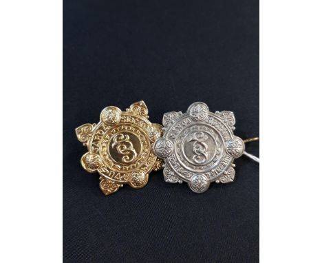 ANTIQUE GARDA SIOCHANA 1ST ISSUE (1922-1940 TYPE) AND 4TH ISSUE (1990'S TYPE) IRISH POLICE CAP BADGES