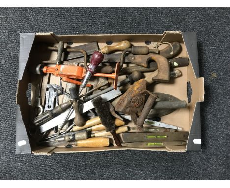 A box of woodworking tools, chisels etc