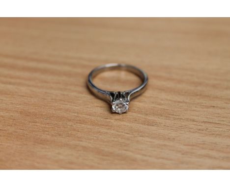 An 18ct white gold solitaire diamond ring