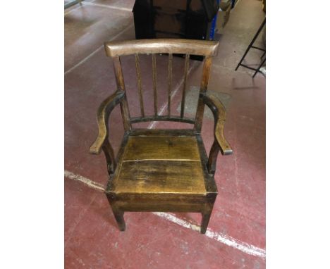 A nineteenth century oak commode chair 