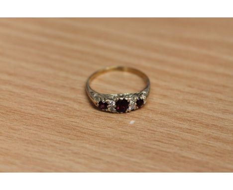 An antique ruby and diamond ring, size M, 2g.
